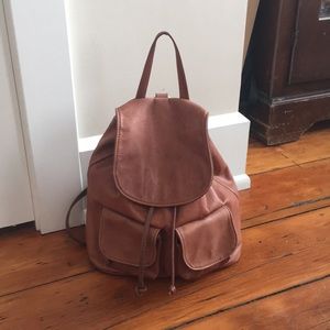 Modern soft leather backpack with adjustable strap